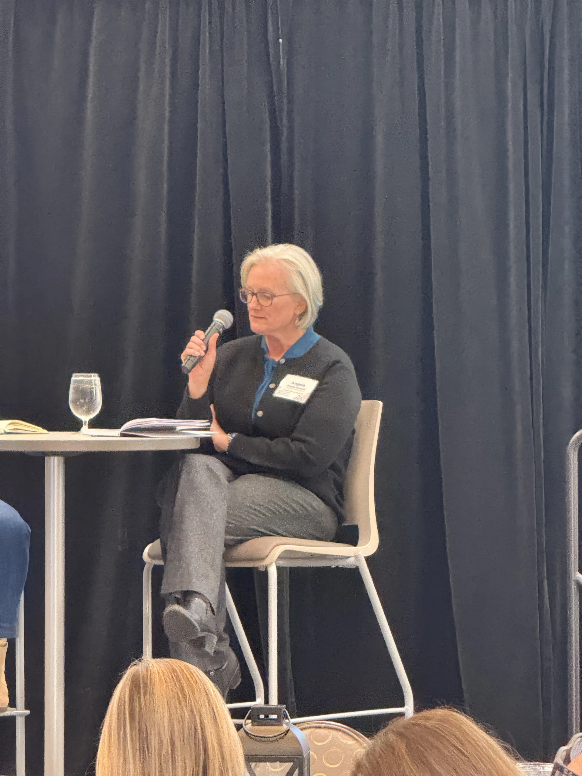 Kitsap PUD General Manager Angela Bennink speaks into a microphone